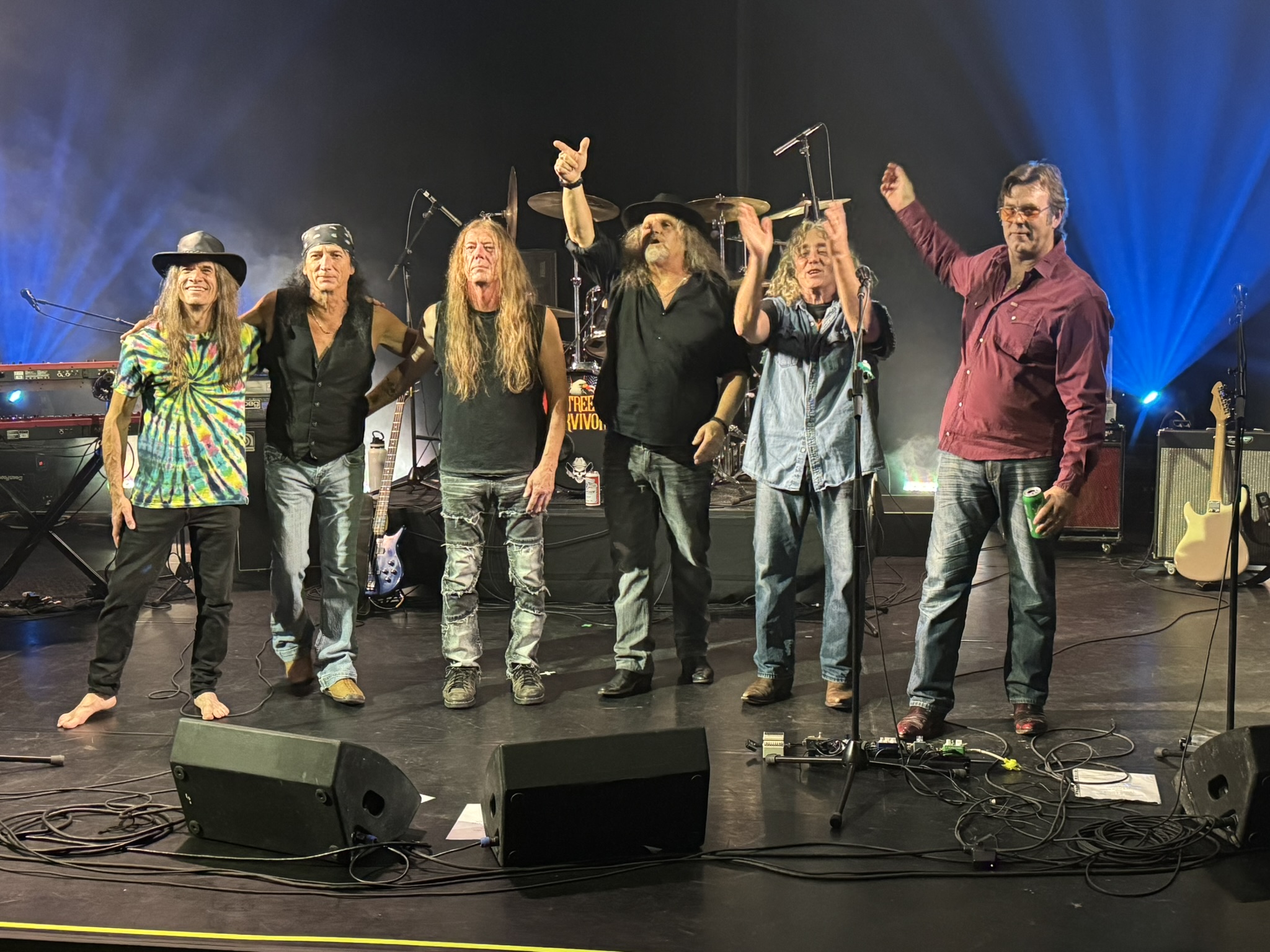 Street Survivors acknowledge the audience at the end of their set.
