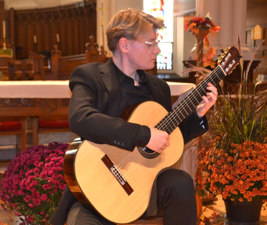 A classical guitar & a talented musician -Priceless!